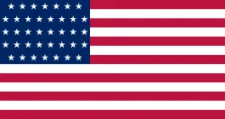 Most recent flag or coat of arms of District of Alaska